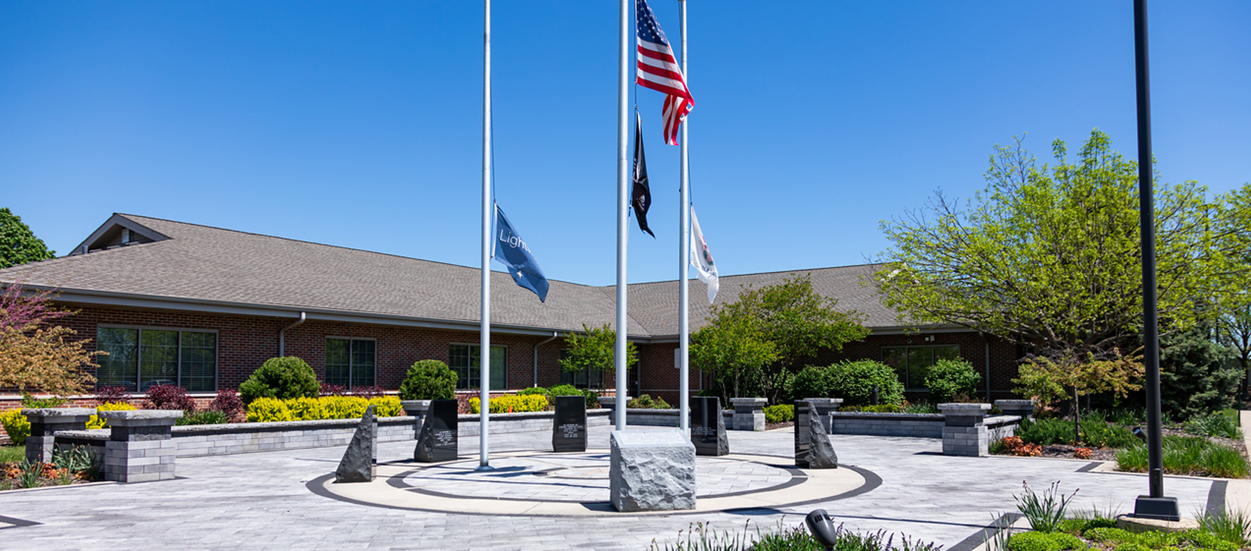 Lightways Veterans memorial flag galleria outdoor space.