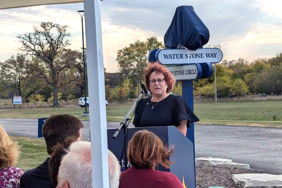 CEO Mary Kay Sheehan speaks at Drive dedication for former CEO